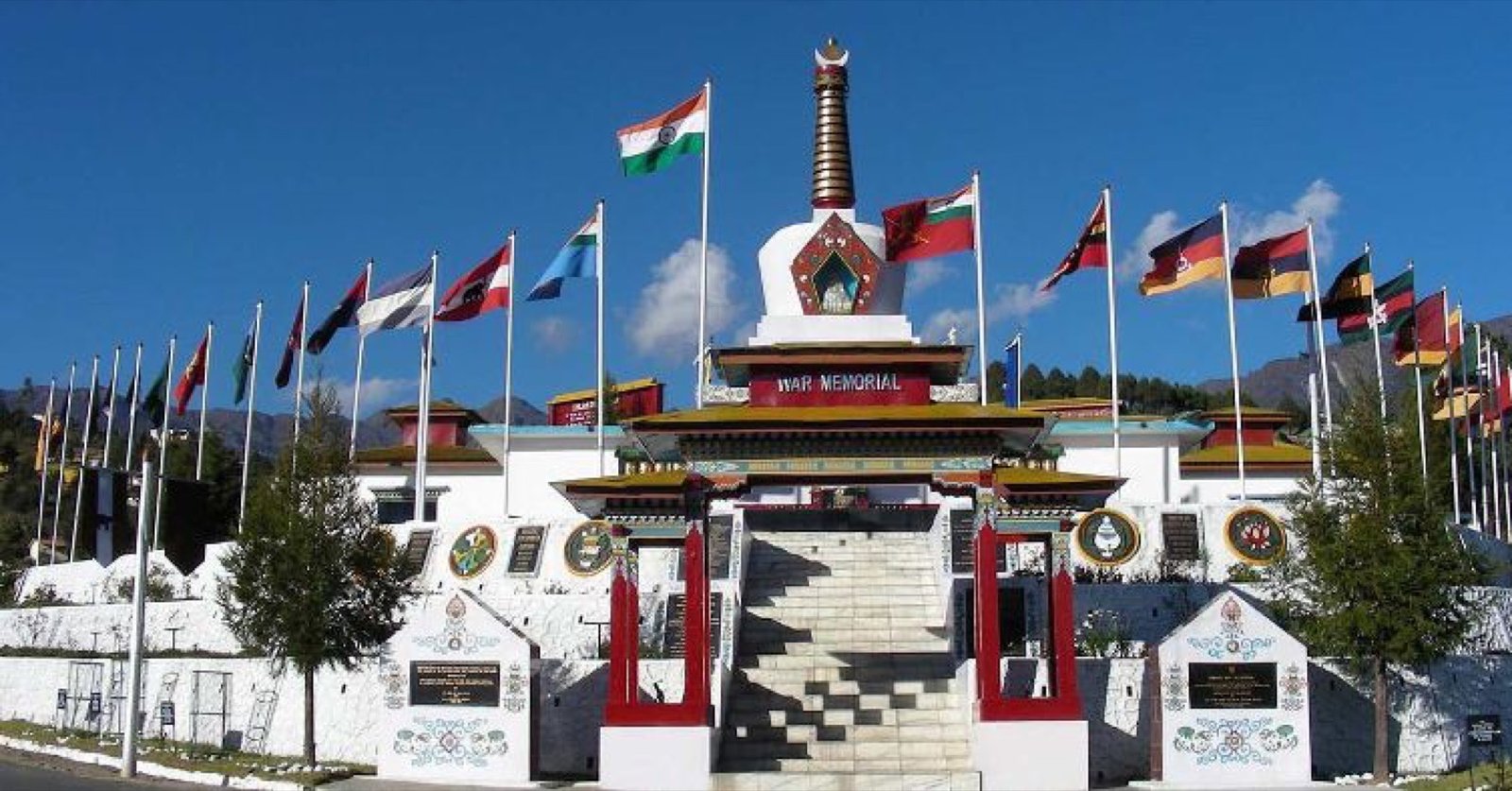 Tawang War Memorial &mdash; Namgyal Chorten, the 40-foot white stupa ringed by regimental flags